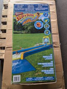 lot 8 image: Wham-O 30ft Constant Air Slip N Slide