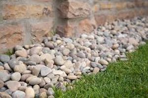 lot 73 image: Amazon Multi Pebbles 1 to 2 12 Bagged Landscape Rock - Full Pallet (27.5 CU FT) - 2,305 Lbs (55 bags total)