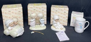 lot 23 image: Lot of Precious Moments inc - Wishing You Roads of Happiness, Blessings From Above, My Happiness and December Mug