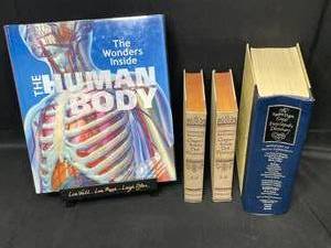 lot 28 image: 3 Dictionary Books and The Wonders Inside the Human Body. Book Stand Included
