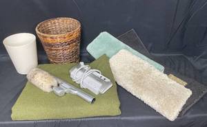 lot 42 image: Variety of Bathmats, Wicker Trash Bin, Electric Duster, Power Strip, Large Green Throw (fleecefelt), Small White Trash Bin