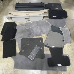 lot 62 image: Carpeted Car Mats and Retractable Trunk Covers - Multiple Colors and Styles