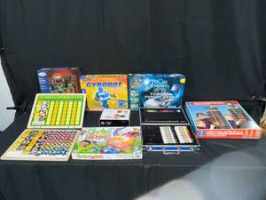 lot 148 image: Lot of Board Games and Building Sets inc some VTG. Coloring Set, Retro Baseball, Magnetic Responsibility Chart, Gyrobot, Chutes and Ladders, Fueling Future Cars, World Famous Buildings Girder and Panel Building Set - all pieces unverified