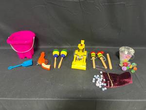 lot 200 image: Assortment of Childrens Toys Inc Crane, Bag of Marbles, Toy Gun & More