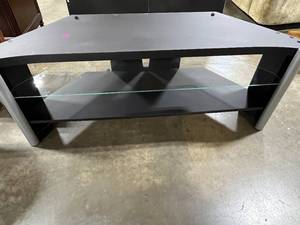 lot 275 image: Black TV Stand with Silver Tone Accents
