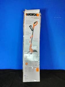 lot 15 image: WORX 15 5.5-Amp Corded Electric Grass TrimmerEdger