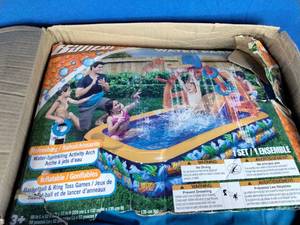 lot 89 image: Banzai Wild Waves Inflatable Water Park with Sprinkling Arch, Basketball Hoop and Ring Toss Game