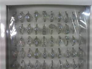 lot 33 image: Lot of 100 Silver w Diamond Styled Costume Jewelry
