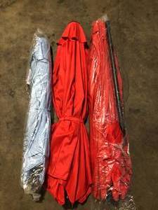 lot 43 image: Lot of Assorted Patio Umbrellas Various Models Sizes and Conditions  Customer Returns See Pictures