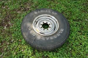 lot 136 image: 8-Bolt Steel Wheel with Tire - 16
