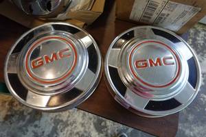 lot 240 image: Vintage GMC Truck Hub Caps