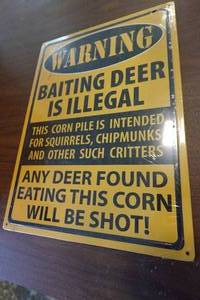 lot 253 image: Novelty Baiting Deer Metal Sign