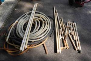 lot 52 image: Large Assortment of Hoses and PVC Pipes