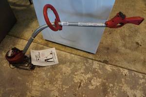 lot 21A image: Homelite Gas String Trimmer