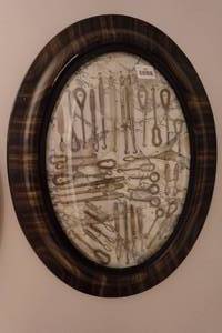lot 136 image: Antique Button Hook Collection in Oval Frame - Advertising Items
