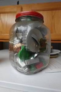 lot 342 image: Glass Jar with Metal Cookie Cutters