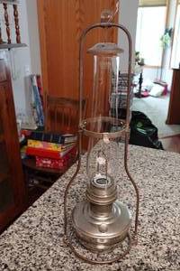 lot 423 image: Antique Aladdin Model 12 Oil Lamp with Original Glass Chimney and Hanger