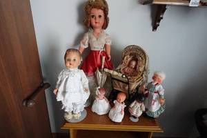 lot 442 image: Assorted Dolls with Small Baby Buggy