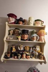 lot 593 image: Wall Hanging Shelf with Royal Doulton Collector Mugs