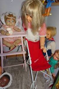 lot 393 image: Dolls with High Chair and BittyBaby Stroller