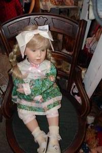 lot 568 image: Doll Sized Chair with Porcelain Face Doll