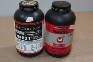 lot 120 image: Partial Cans Hodgdon H4831 Rifle Powder