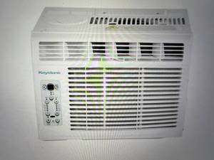 lot 7 image: Keystone 12,00011,600 BTU 230V WindowWall Air Conditioner with Supplemental Heat and Remote