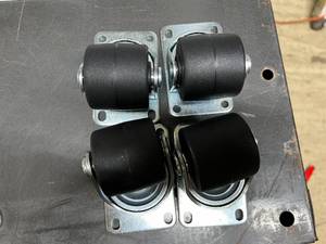 lot 49 image: Wide Wheel Castor Set