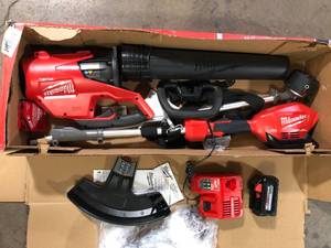 lot 29 image: Milwaukee M18 FUEL 18V Lithium-Ion Brushless Cordless QUIK-LOK String TrimmerBlower Combo Kit with Battery & Charger (2-Tool)  Customer Returns See Pictures