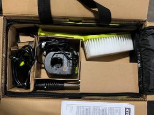 lot 47 image: RYOBI ONE HP 18-Volt Brushless EZClean 600 PSI 0.7 GPM Cordless Electric Power Cleaner w 4.0Ah Battery, Charger, Accessories Customer Returns See Pictures