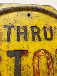 lot 17 image: Antique Embossed Steel Yellow STOP Sign