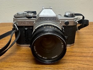lot 29 image: Vintage Canon AE-1 35mm Film Camera (Untested)
