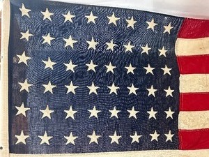 lot 37 image: Vintage Cotton 48 Star Flag on Small Pole
