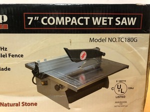 lot 59 image: New in Box Tile Shop 7 Compact Wet Saw