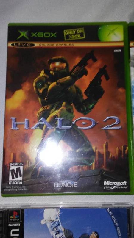 lot 51 image: Video Games - Box And Play Station(6) Tiger Woods Golf, Halo 2, And More.