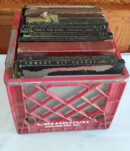 lot 33 image: Vintage Carnation Milk Crate With Vintage Albums.