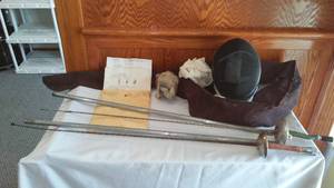 lot 34 image: Fencing Helmet, Gloves, Pole And More.