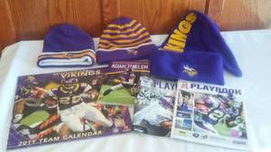 lot 114 image: Minnesota Vikings Winter Hats, Calendar And Playbooks.