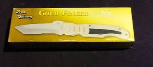 lot 278 image: Frost Goldfinger Folding Knife.