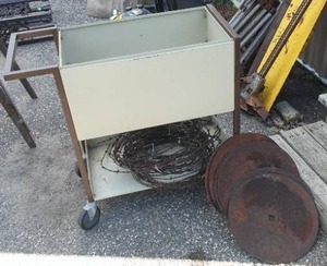 lot 298 image: Rolling Storage Cart, Barbed Wire, Plow Disks (6)