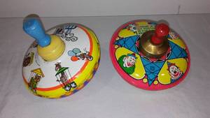 lot 308 image: Vintage Ohio Art and Chein Pressed Tin Litho Toy Tops (2).