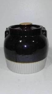 lot 321 image: Glazed Stoneware Bean Pot with Lid and Bail Wire Handle.