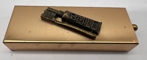 lot 60 image: Vintage Travel Toothpaste and Toothbrush by GOLD TONE PRODUCTS