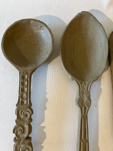 lot 131 image: Cast Iron Decorative Wall Dining Utensils