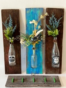 lot 93 image: Repurposed Barnwood Wall Hangings with Vintage Bottles, Faux Flowers & Clip Note Board Decor