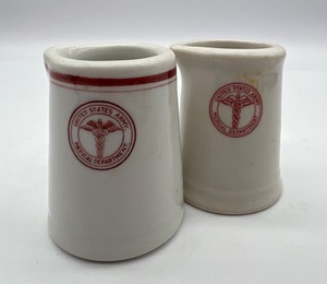 lot 168 image: Pair of United States Army Medical Department Creamers by Mc NICOL China & ROYAL CHINA, INC. - Restaurant Ware