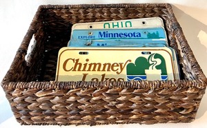 lot 181 image: Wicker Basket with License plates - QTY 19