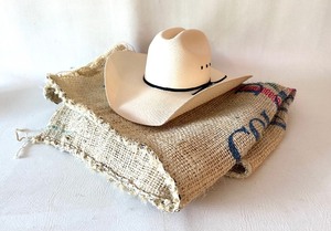 lot 275 image: LASSO COWBOY HAT and Colombian BURLAP Coffee Sack