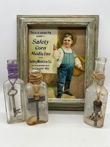 lot 314 image: Vintage Farmers Advertising and Upcycled Bottles with Vintage Keys