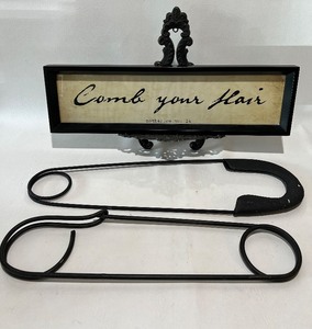 lot 339 image: POTTERY BARN ART, Jumbo Clothes Pins Art and Metal Easel